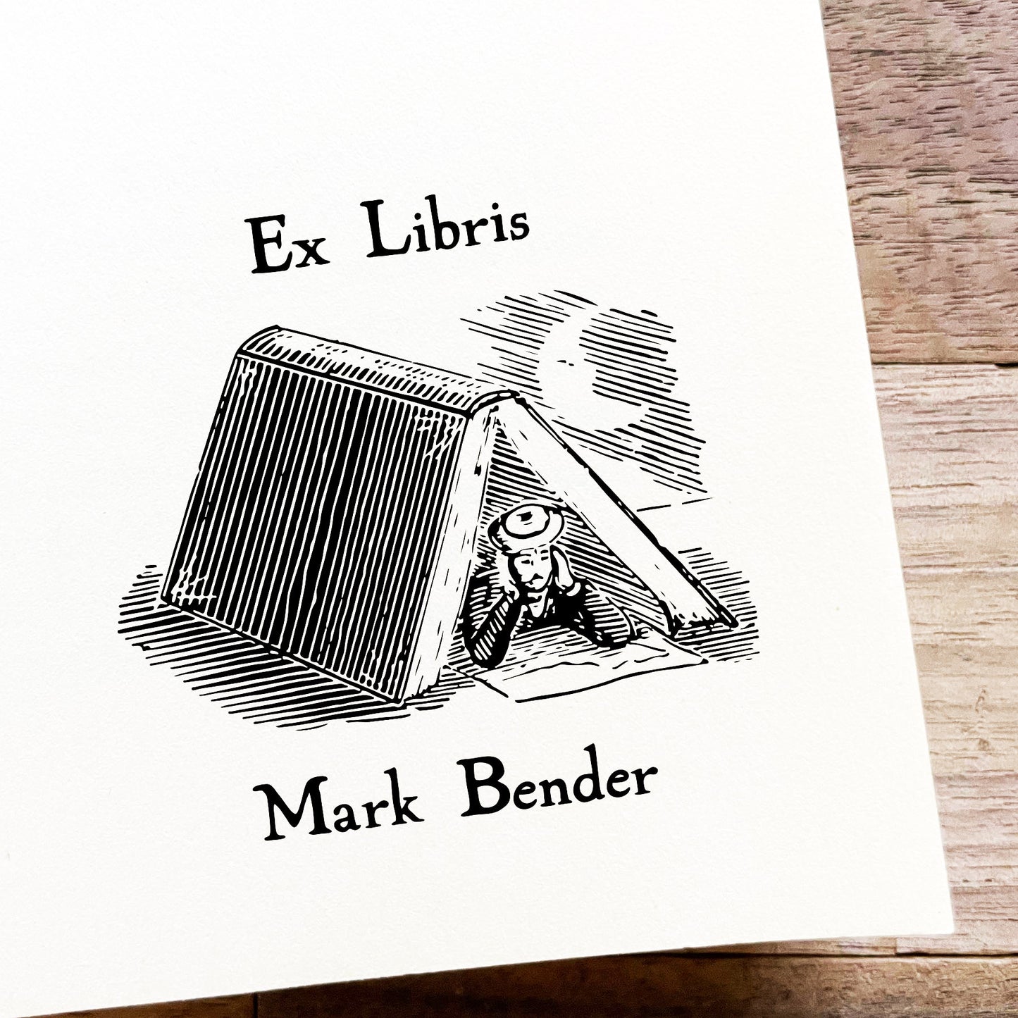 Ex Libris Stempel - Mann unter Buch