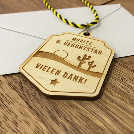 6+ Holzmedaillen "Wilder Westen" als Gastgeschenk